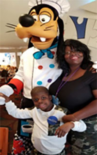 Vaquon with his Mom at Disney World